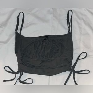 Dark green shein crop top with ties on the sides.